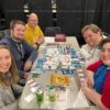 Five gamers playing Haunted Inheritance